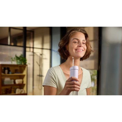 Іригатор Philips портативний Sonicare Compact Flosser 1000, чаша 200 мл, складний, фіолетовий