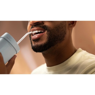 Іригатор Philips портативний Sonicare Compact Flosser 1000, чаша 200 мл, складний, голубий Іригатор Philips портативний Sonicare Compact Flosser 1000, чаша 200 мл, складний, голубий