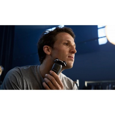 Бритва електр. Philips роторна Series 7000 SkinIQ,  бритв.головок-4, Li-Ion, сух.+волог., індикатор заряду, тример, чохол, чорний